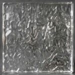 A sophisticated, highly refractive pattern that blends soft ripples with flowing, abstract swirls. The texture creates dynamic light play, offering a premium alternative to standard obscure glass.