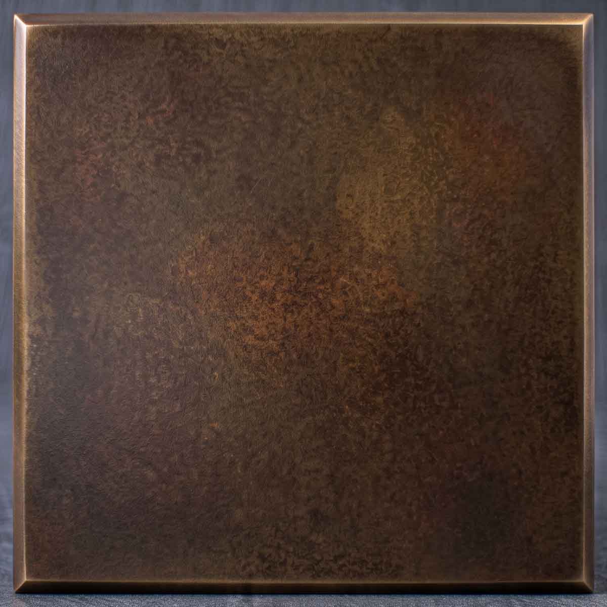 A rich, hand-rubbed finish that brings out the warm, mottled undertones of aged metal. It provides a timeless, historic elegance for classic and bespoke pieces.