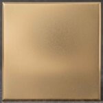 A sophisticated, matte bronze finish with a soft, uniform texture. It offers a contemporary, understated elegance that highlights structural silhouettes.
