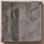 A deep, dense plush mohair in versatile slate grey. Offers tactile warmth and a substantial, enveloping pile suited for cozy, sophisticated collectible forms.
