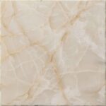 Ivory Onyx displays a soft, translucent cream base with delicate, cloudy white and subtle gold veining, creating an ethereal and luminous warmth for collectible pieces.