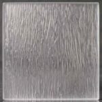 A contemporary variation on traditional reeded glass. This pattern utilizes dense, fine vertical lines on a frosted substrate, creating an elegant, sophisticated texture with high obscurity.