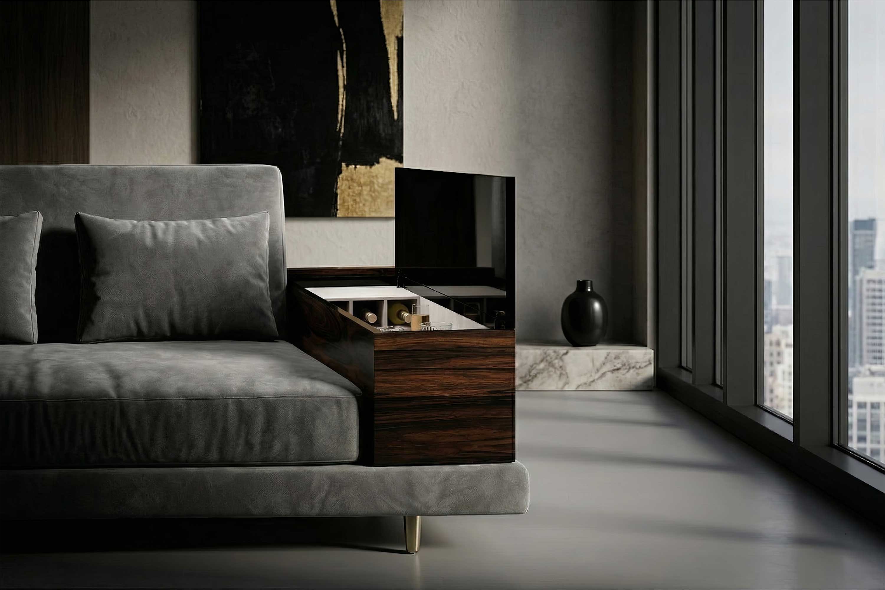 A modern living room with a gray sofa, a built-in wooden side table featuring storage compartments, floor-to-ceiling windows, a black vase, a marble surface, and abstract wall art in the background. Accents of bronze and handmade decor add character to the space.