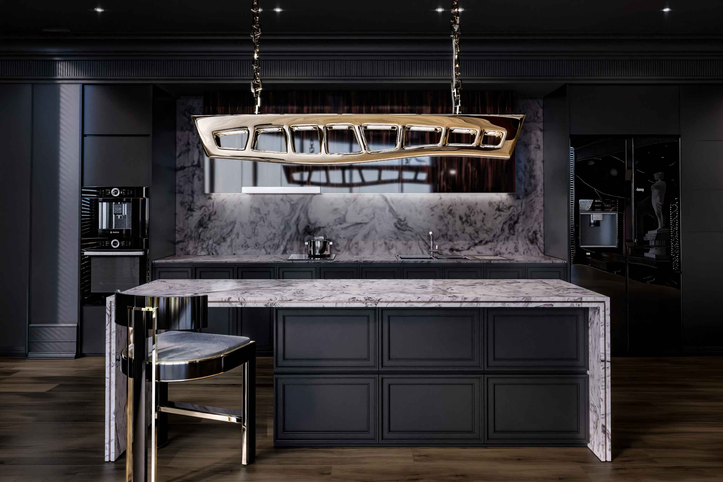 A modern kitchen with dark cabinets, marble countertops and backsplash, a metallic light fixture above the island, and a metallic chair with a dark seat, all set against wood flooring.
