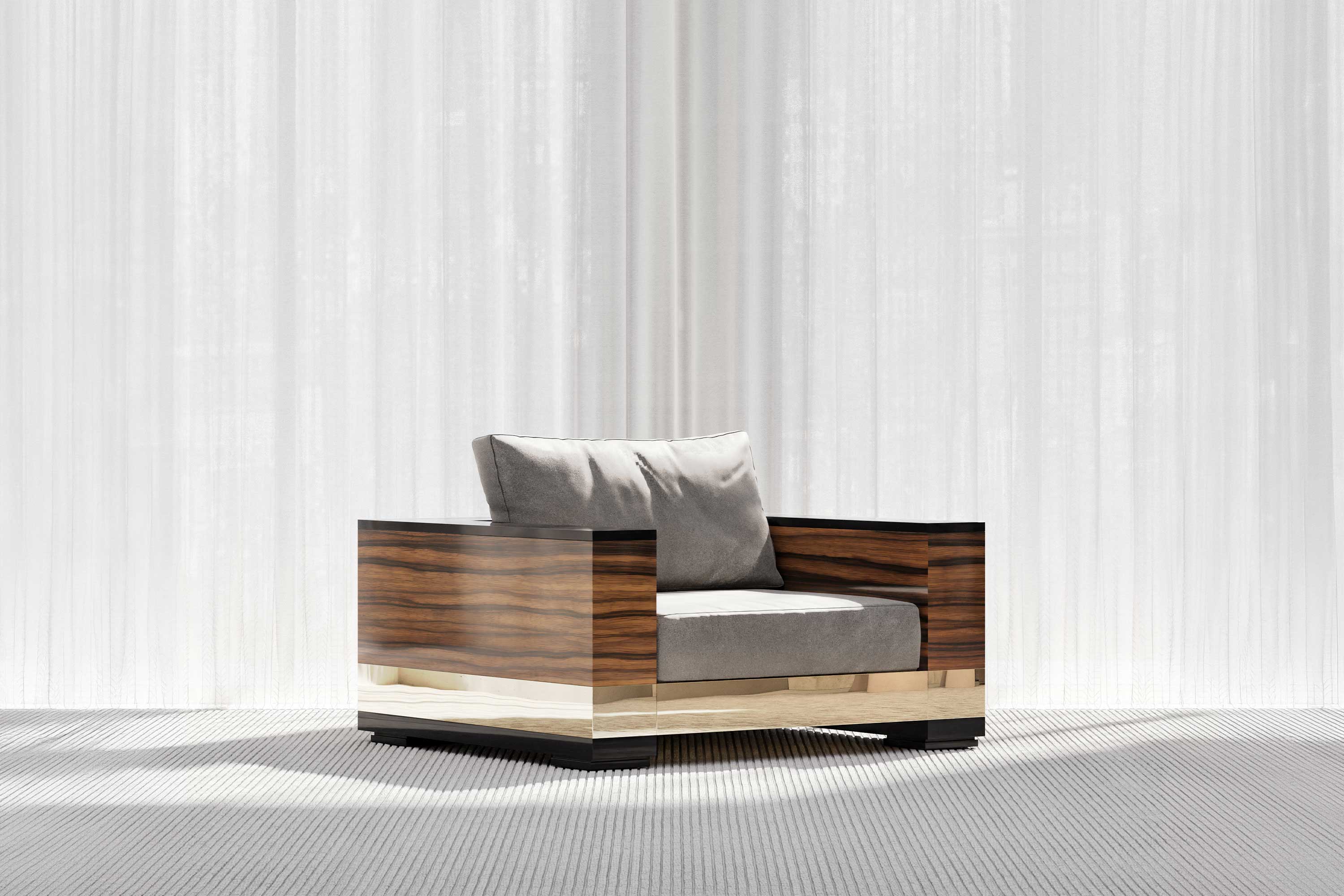 Giuseppe Lounge Chair, sculptural luxury lounge chair staged in a soft light-filled contemporary interior with sheer curtains — Palena Studio