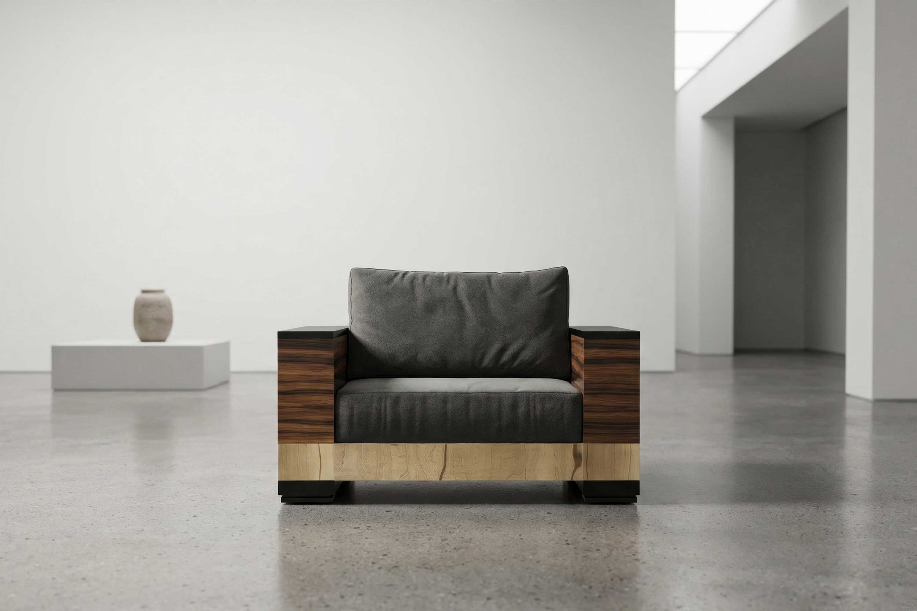 Giuseppe Lounge Chair, sculptural luxury lounge chair with dark upholstery staged in a refined minimal interior — Palena Studio