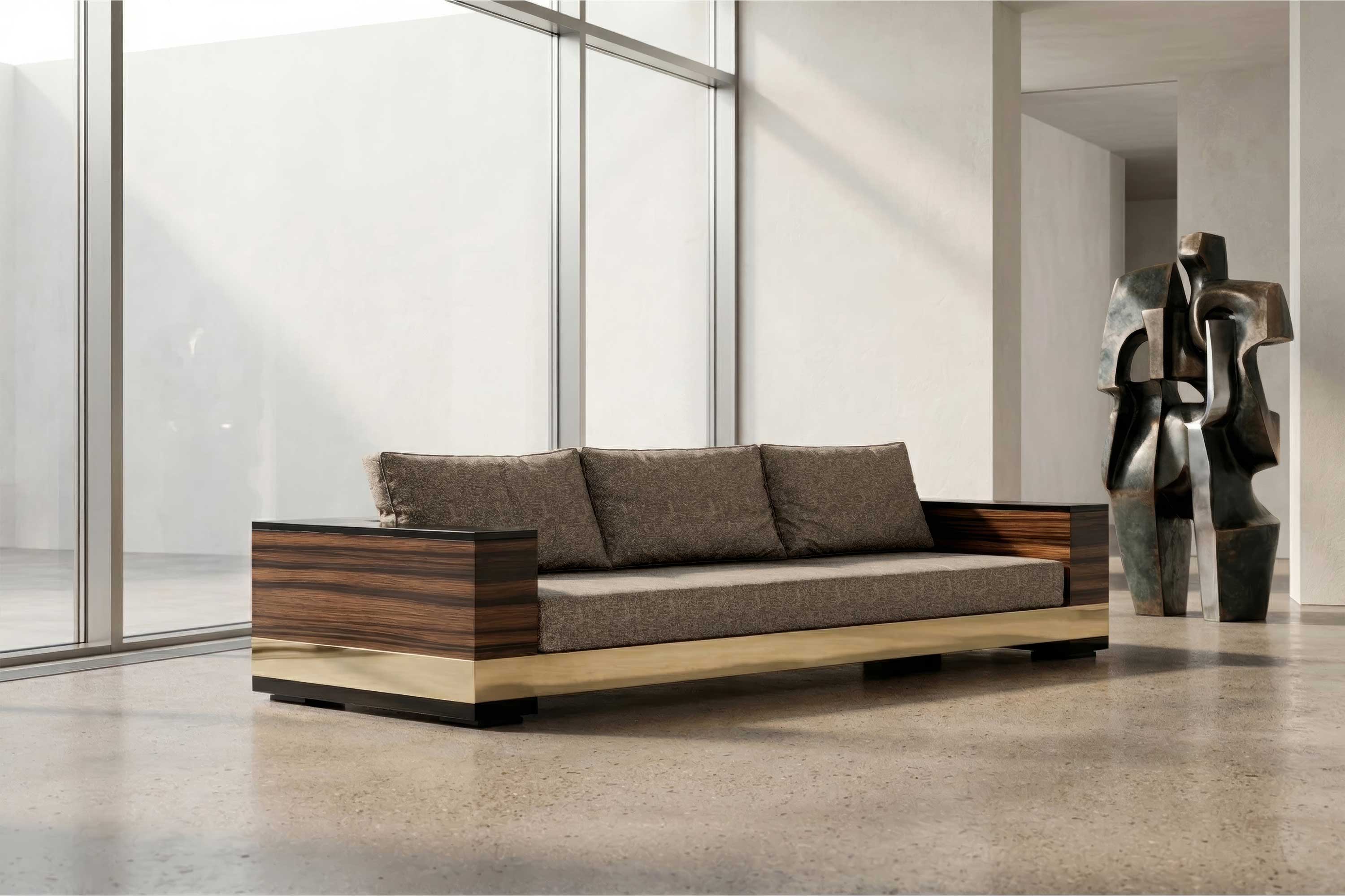 Giuseppe Sofa in neutral upholstery with wood frame, sculptural luxury sofa staged in a bright open contemporary living room — Palena Studio