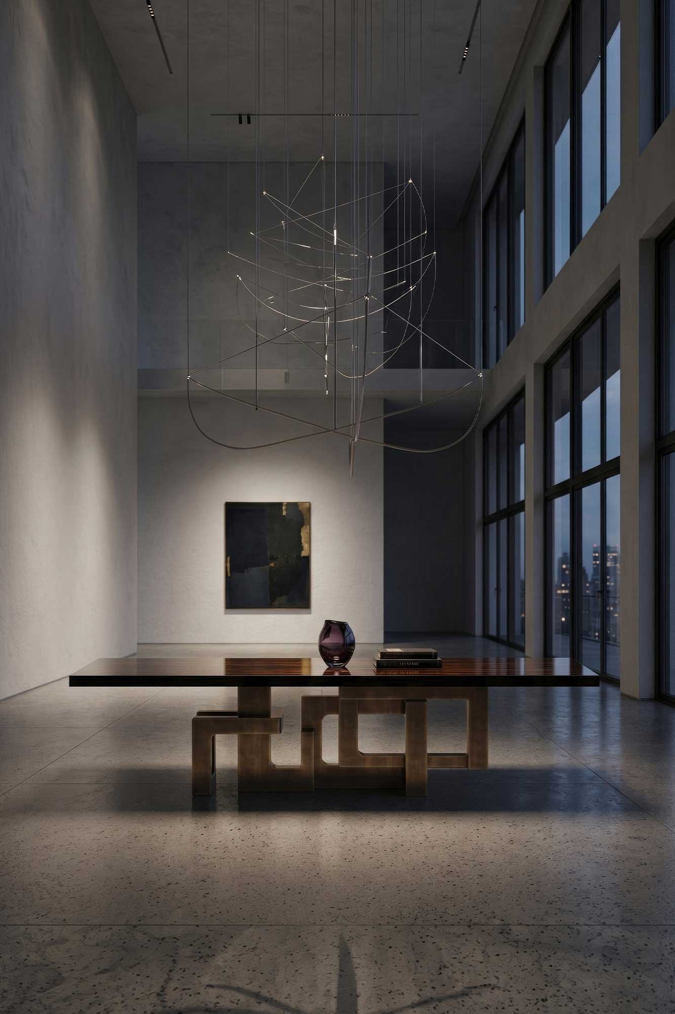 Labirinto Dining Table in patina bronze, sculptural maze-base dining table staged in a bright tall-ceilinged contemporary interior — Palena Studio