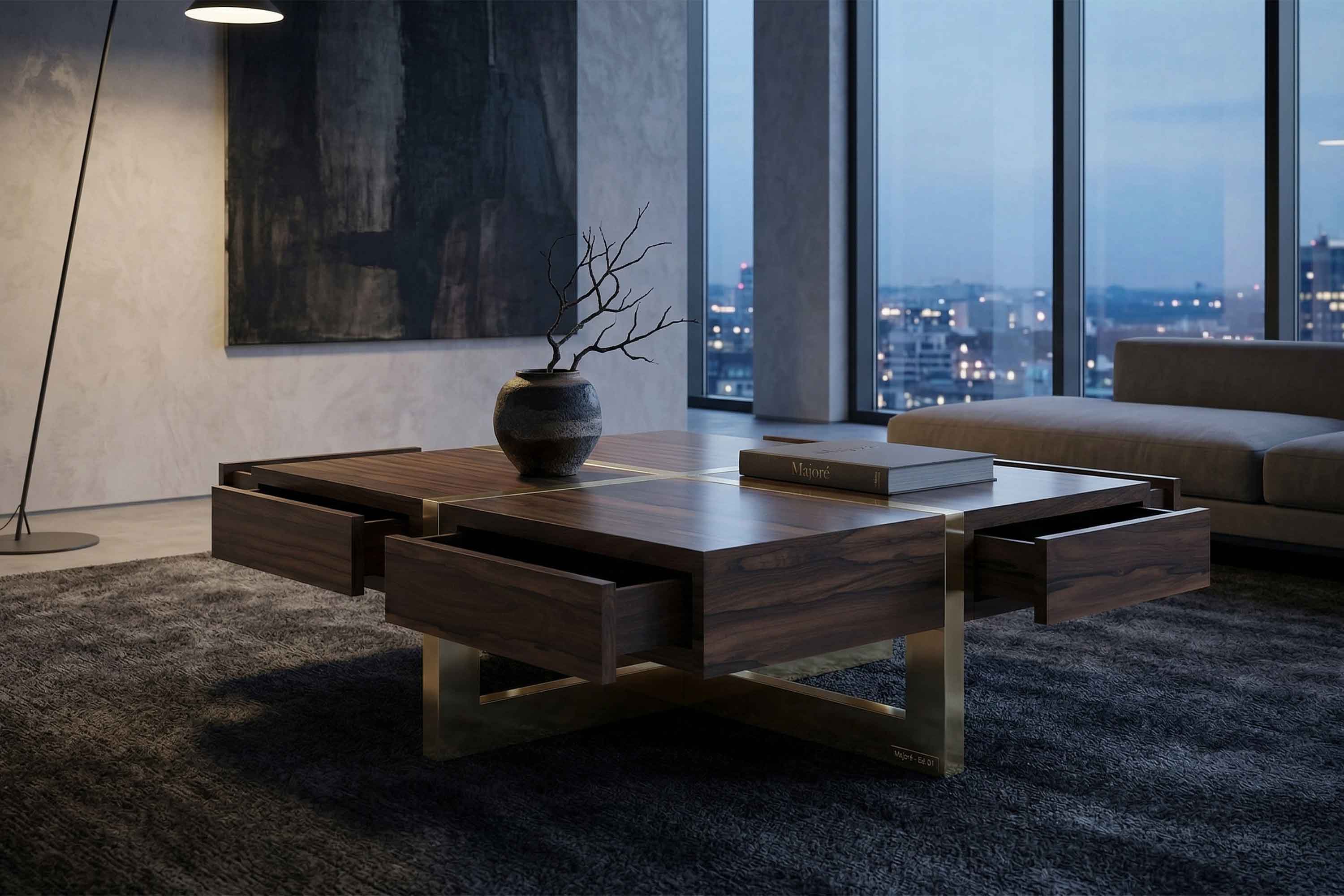 Modern living room with a dark wood coffee table featuring open drawers, a vase with twigs, and a book on top; large windows show a city view at dusk, with neutral-colored walls and furniture.