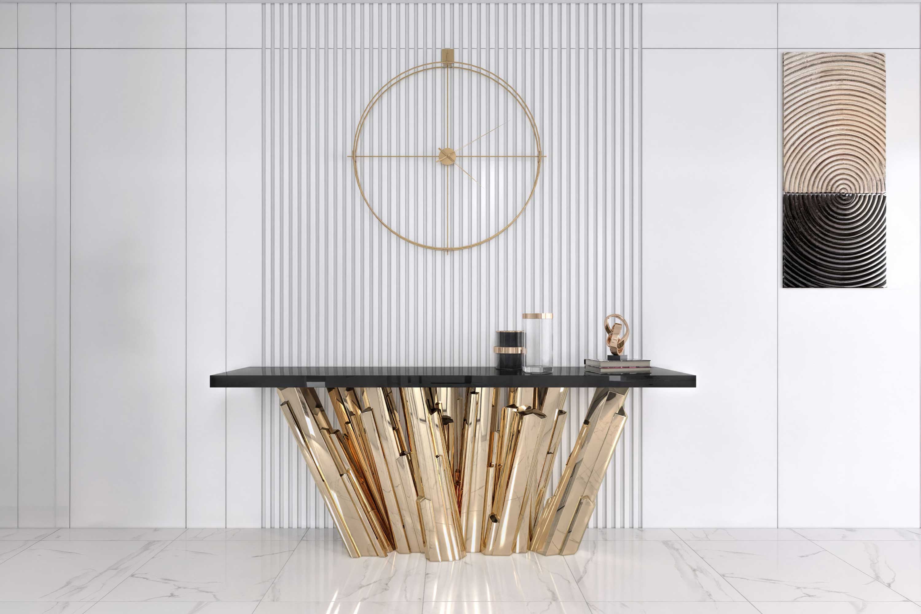 A modern entryway with a sculptural gold and black console table, a minimalist gold wall clock, two decorative objects, and a geometric artwork on a white paneled wall with vertical grooves.