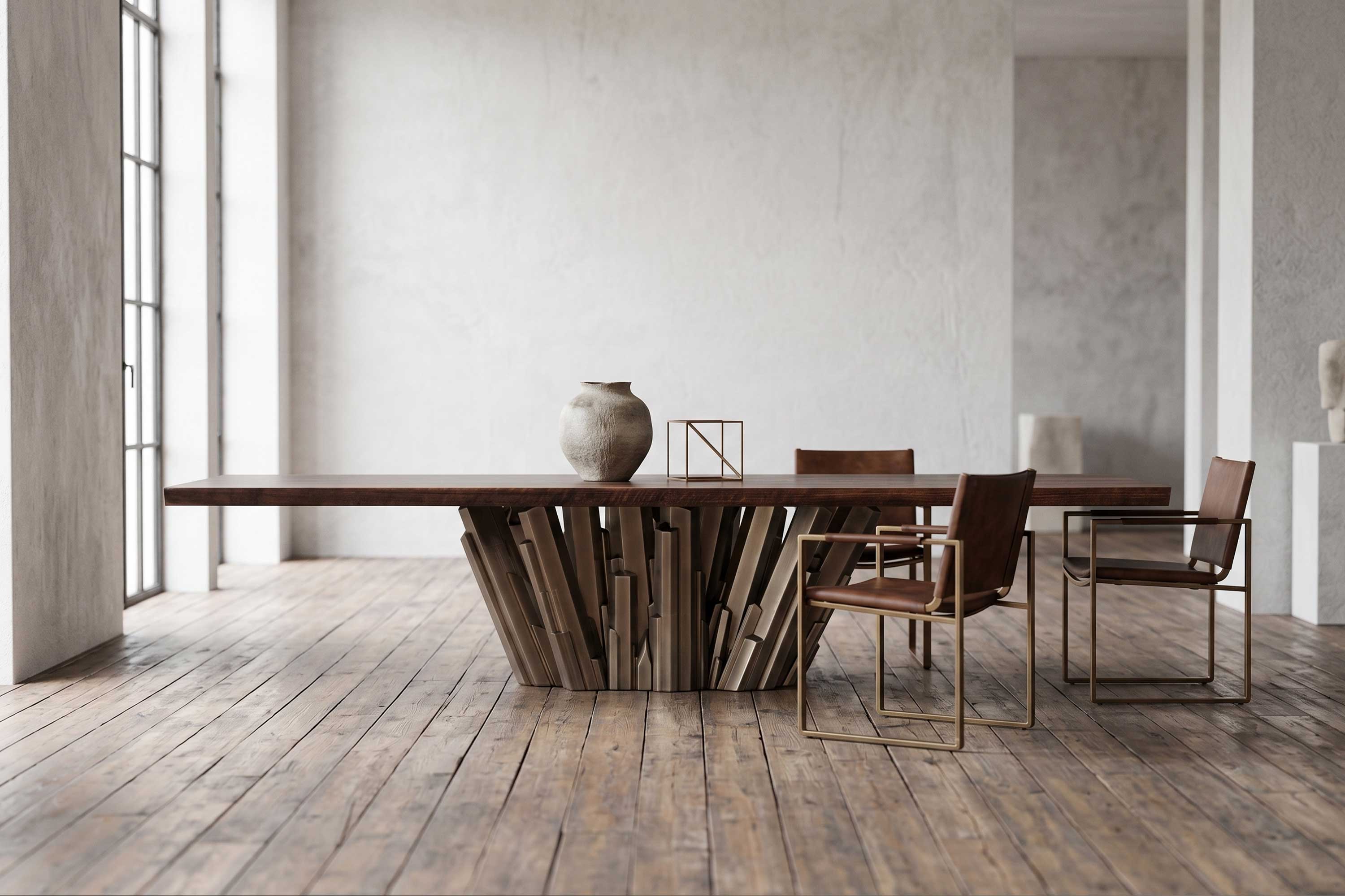 Meta Crystal Dining Table in patina bronze, sculptural luxury dining table staged in a bright minimal interior with tall industrial windows — Palena Studio