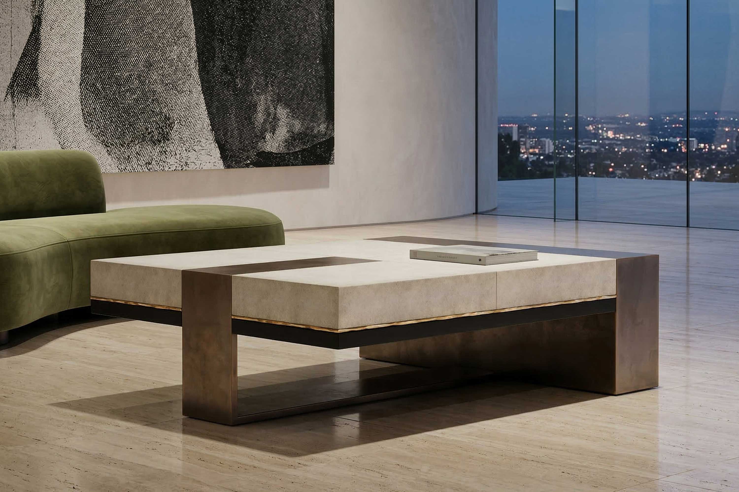 Modern living room with a geometric coffee table, featuring a stone top and metal legs, next to a green curved sofa. Large window shows a city view, and abstract art hangs on the wall. A book rests on the table.