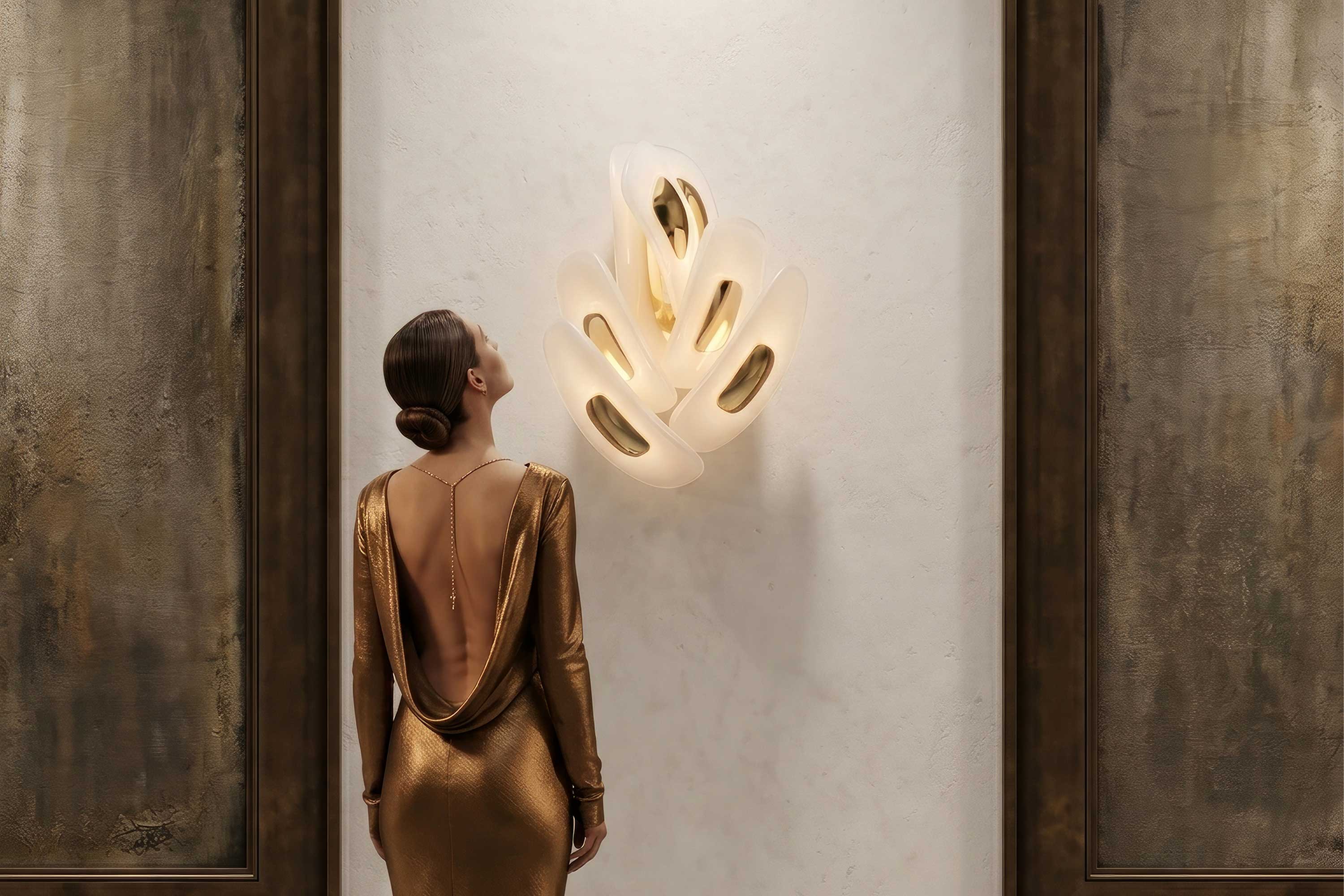 Swan Sconce in milky glass, organic sculptural wall sconce staged against a warm stone wall — Palena Studio