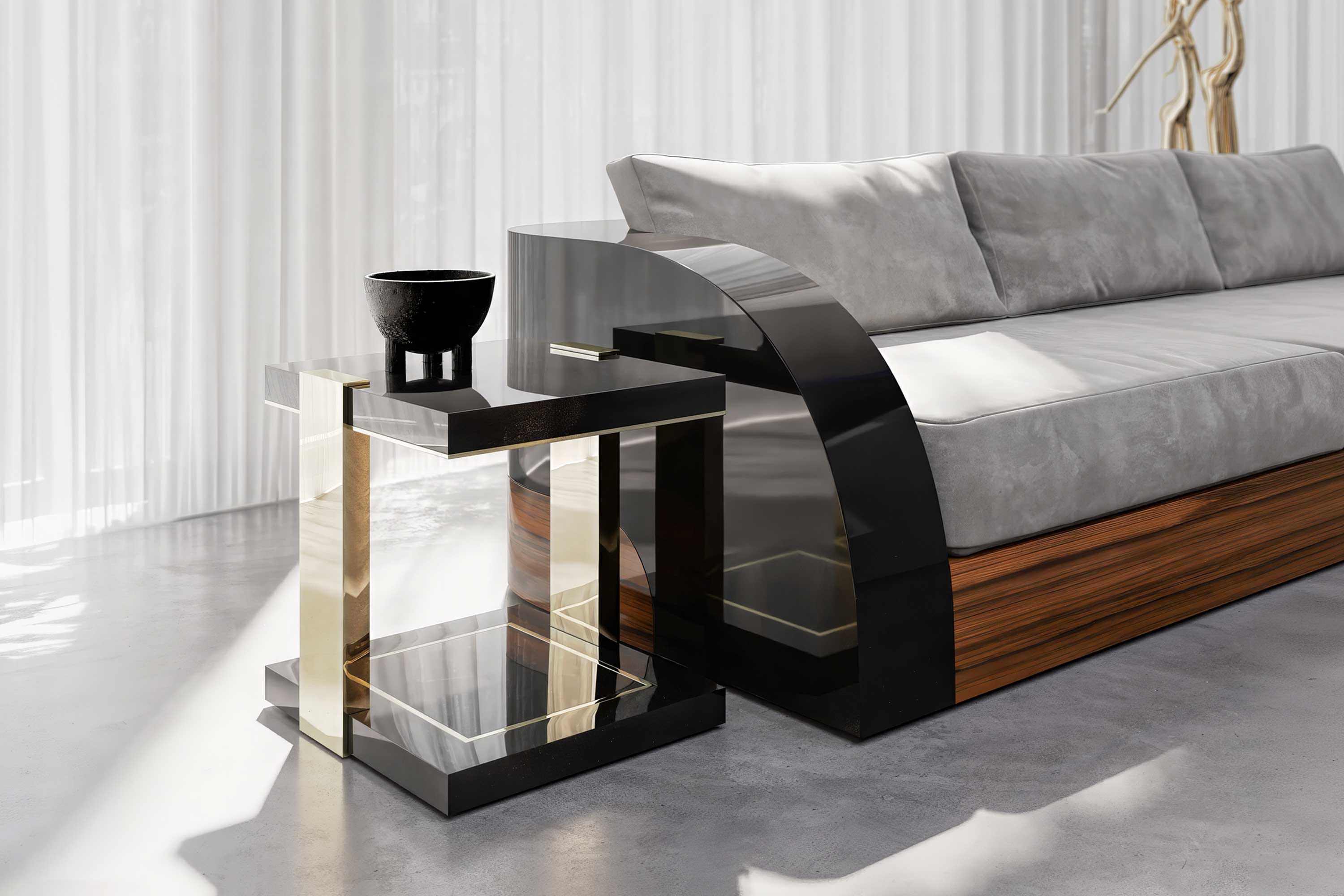Twin Side Table in bronze, sculptural luxury side table staged in a refined living interior with dark sofa and warm lighting, Palena Studio