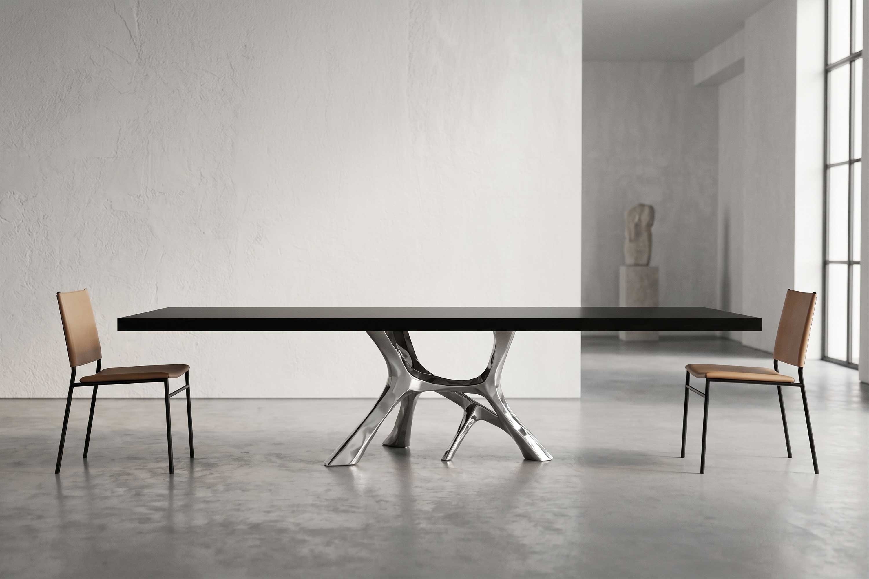 Vena Dining Table in stainless steel, sculptural organic-form dining table staged in a bright minimal interior — Palena Studio