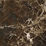 Emperador Dark marble features a rich, deep brown canvas interwoven with intricate cream and gold veining. This classic stone adds a profound sense of warmth and traditional luxury to bespoke furniture pieces.