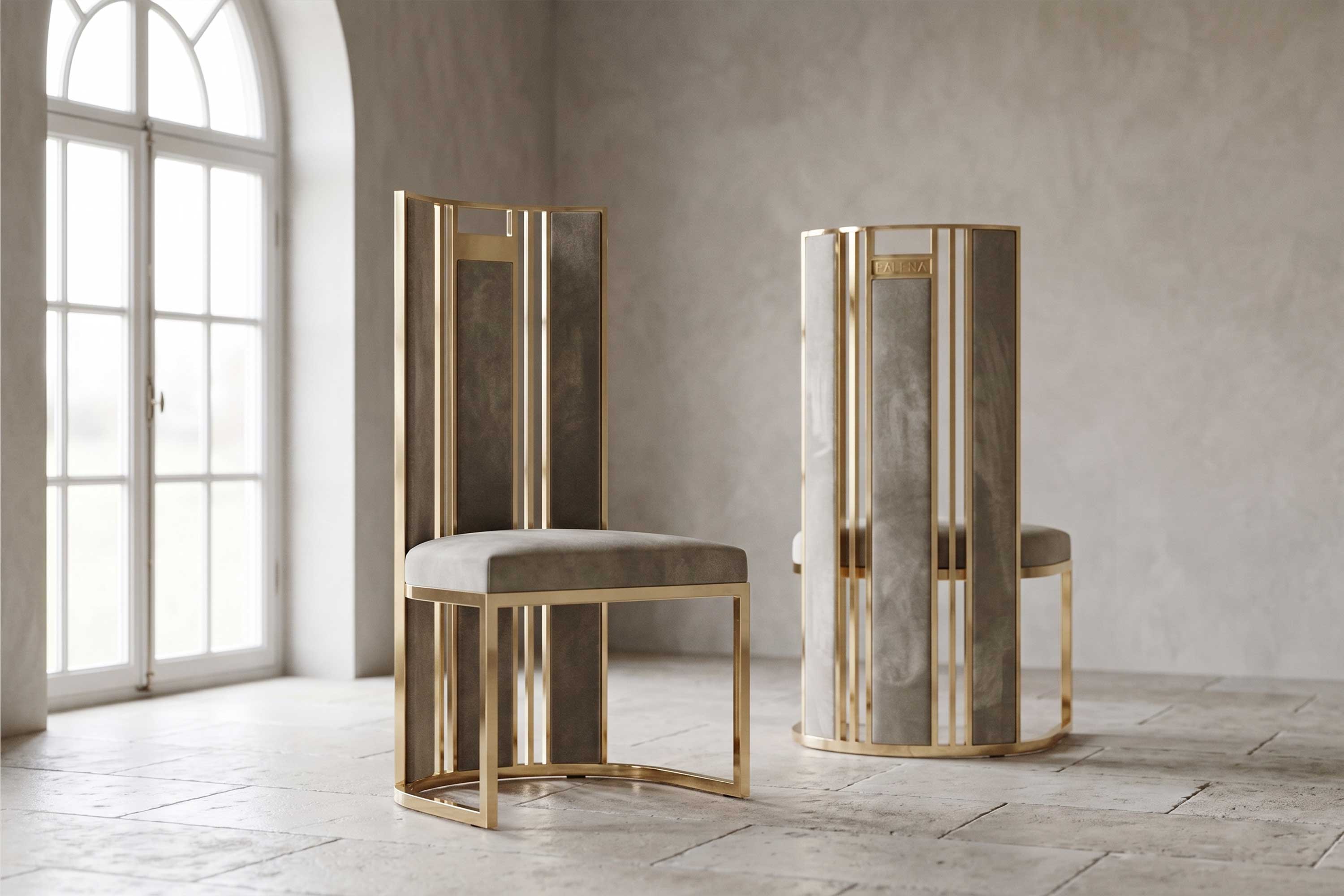 Two Colonna Chairs with tall columnar backs, polished bronze fluted frames and velvet inserts, staged in a plaster interior with arched windows — Palena Studio