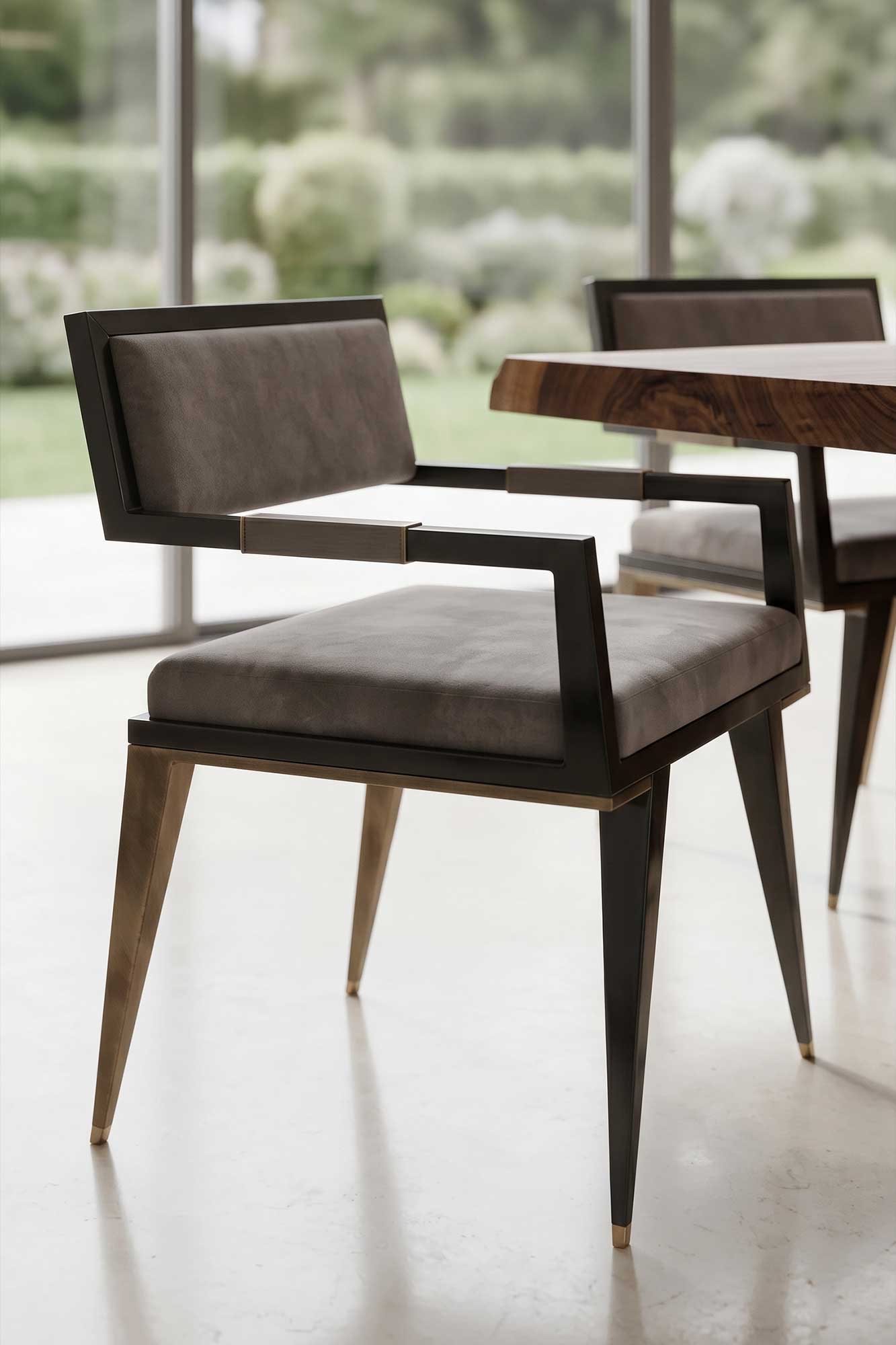 Le Loup Chair with an obsidian lacquer frame, tapered patina bronze legs and velvet upholstery, staged in a bright interior with garden views — Palena Studio